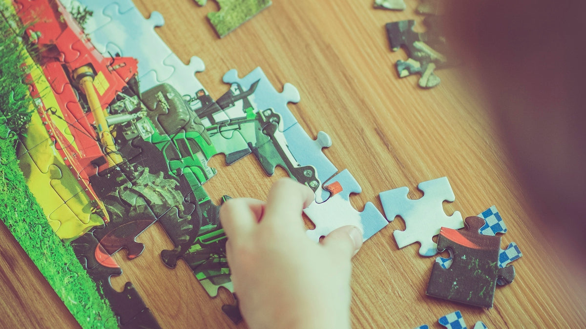 boy playing puzzle