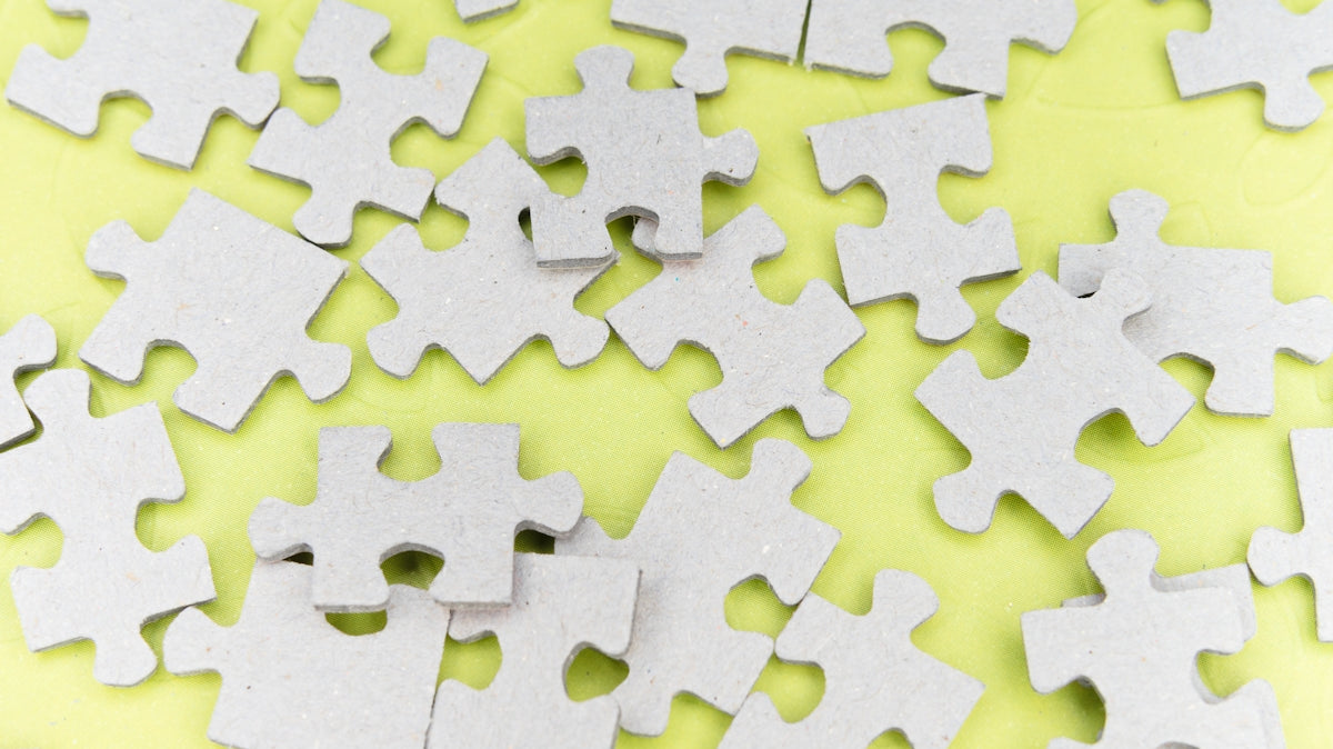 green and black jigsaw puzzle