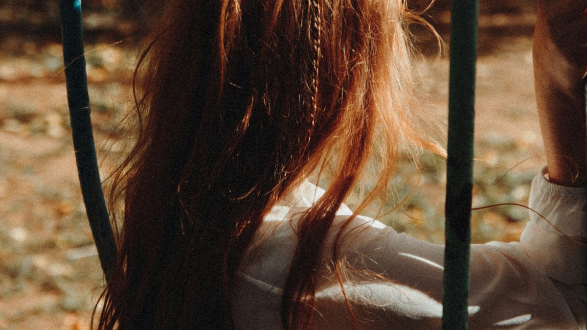 woman in white long sleeve shirt