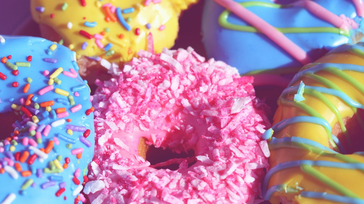 pink yellow and blue floral doughnut