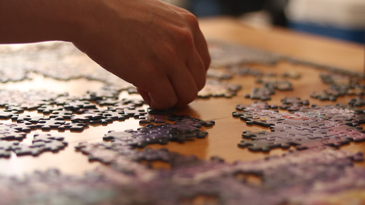 a hand on a map