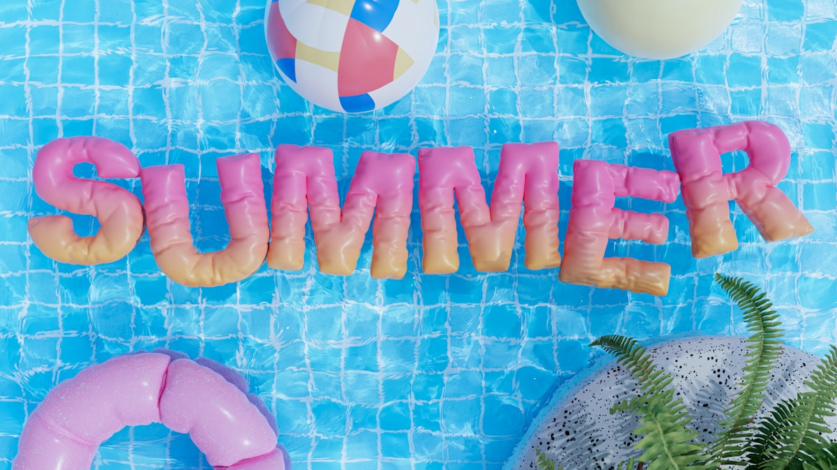 a pool with a pool float, inflatable toys, and the word summer