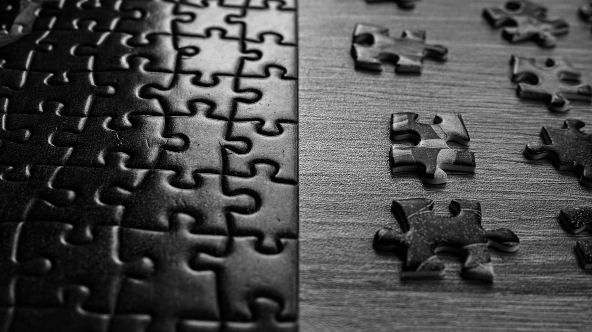 a close up of a puzzle on a table