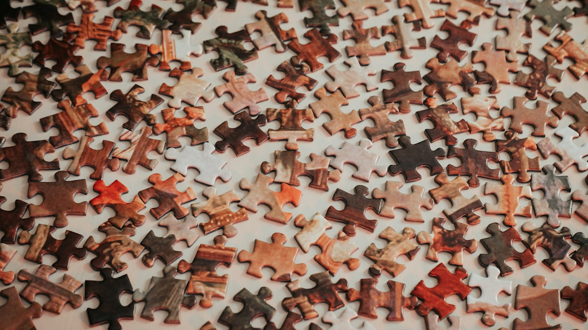 a close up of a puzzle on a table