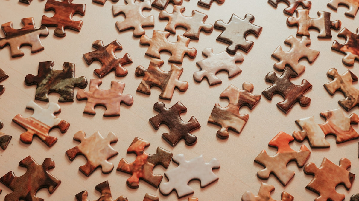 a close up of a puzzle on a table