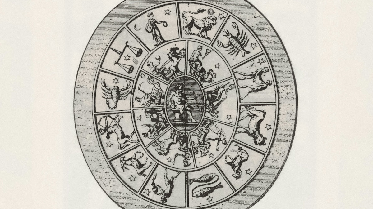 Zodiac wheel with astrological symbols and figures