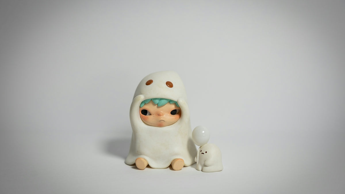 A cute ghost figure with a small bunny