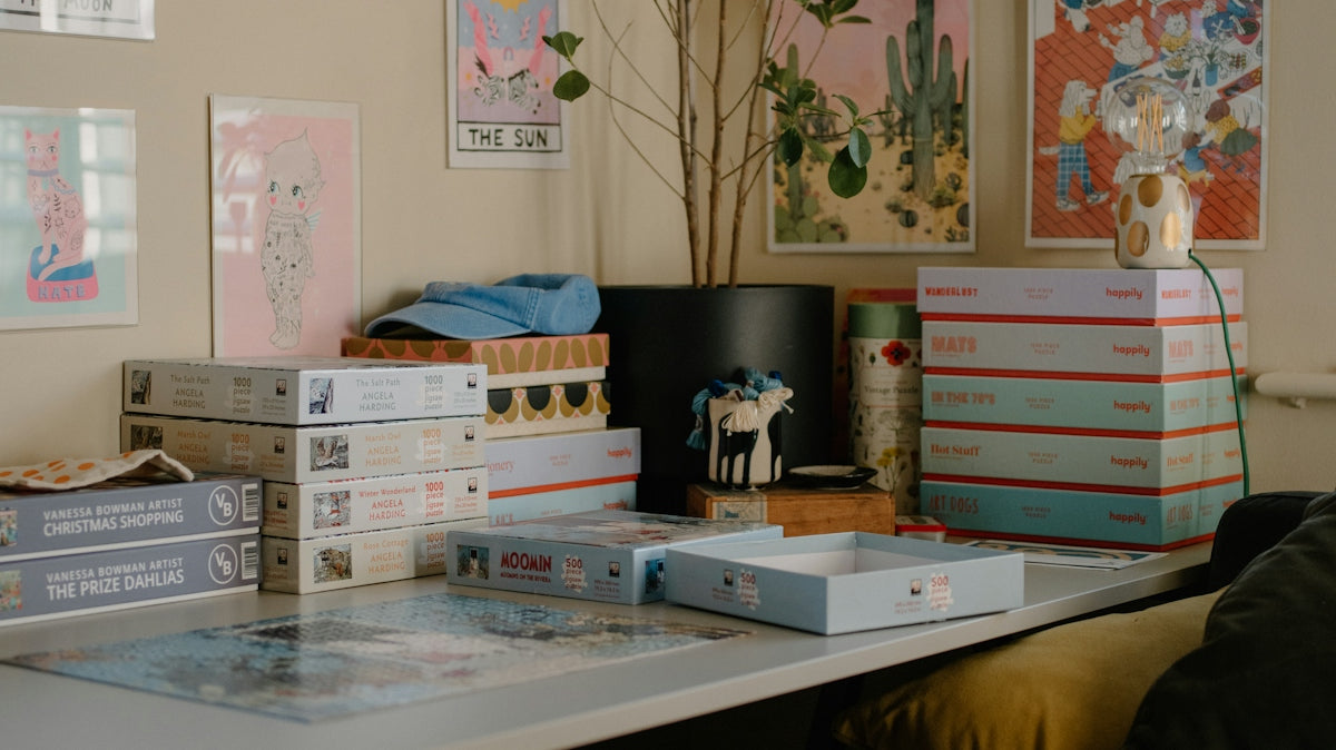 Desk with puzzles and colorful wall art