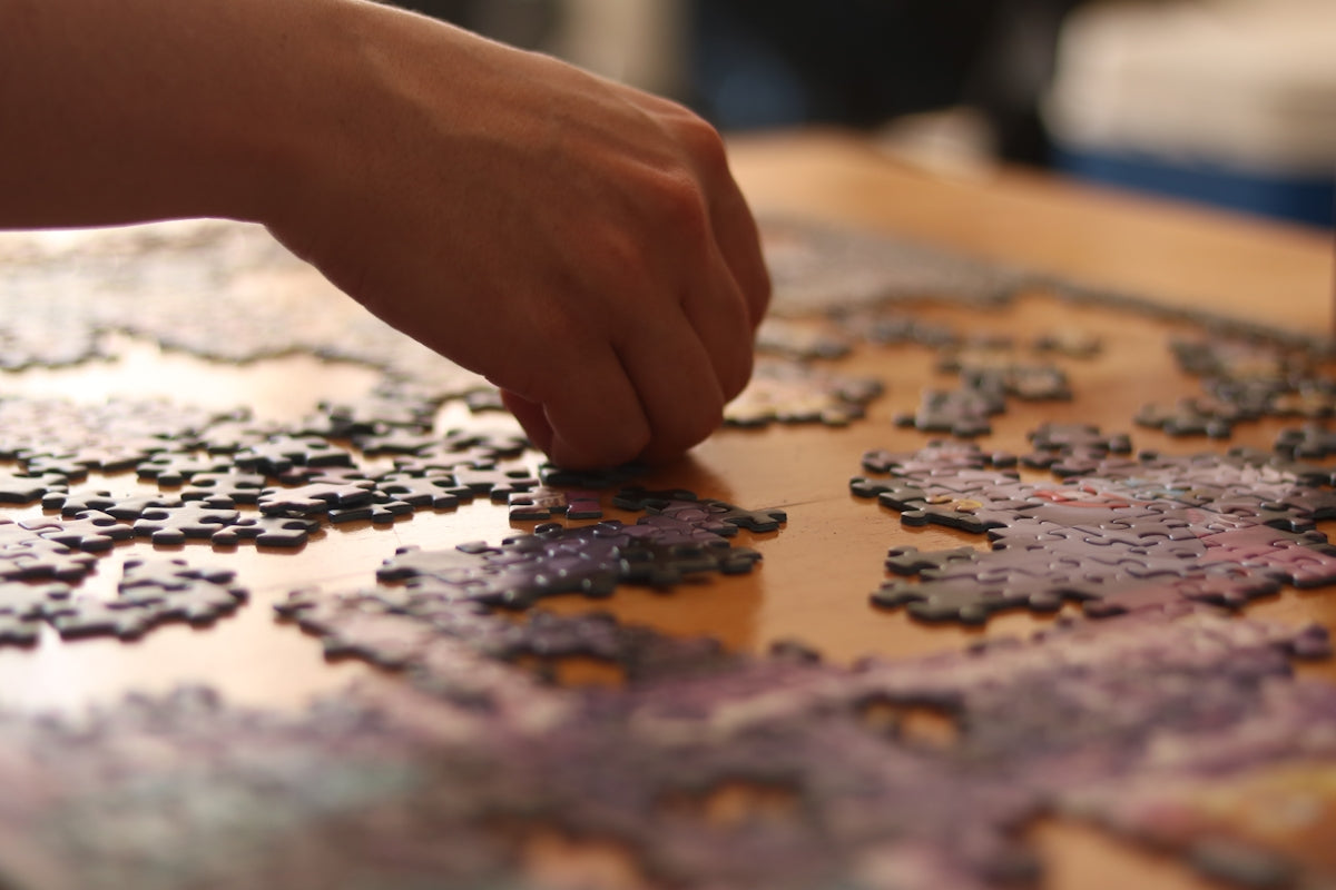a hand on a map