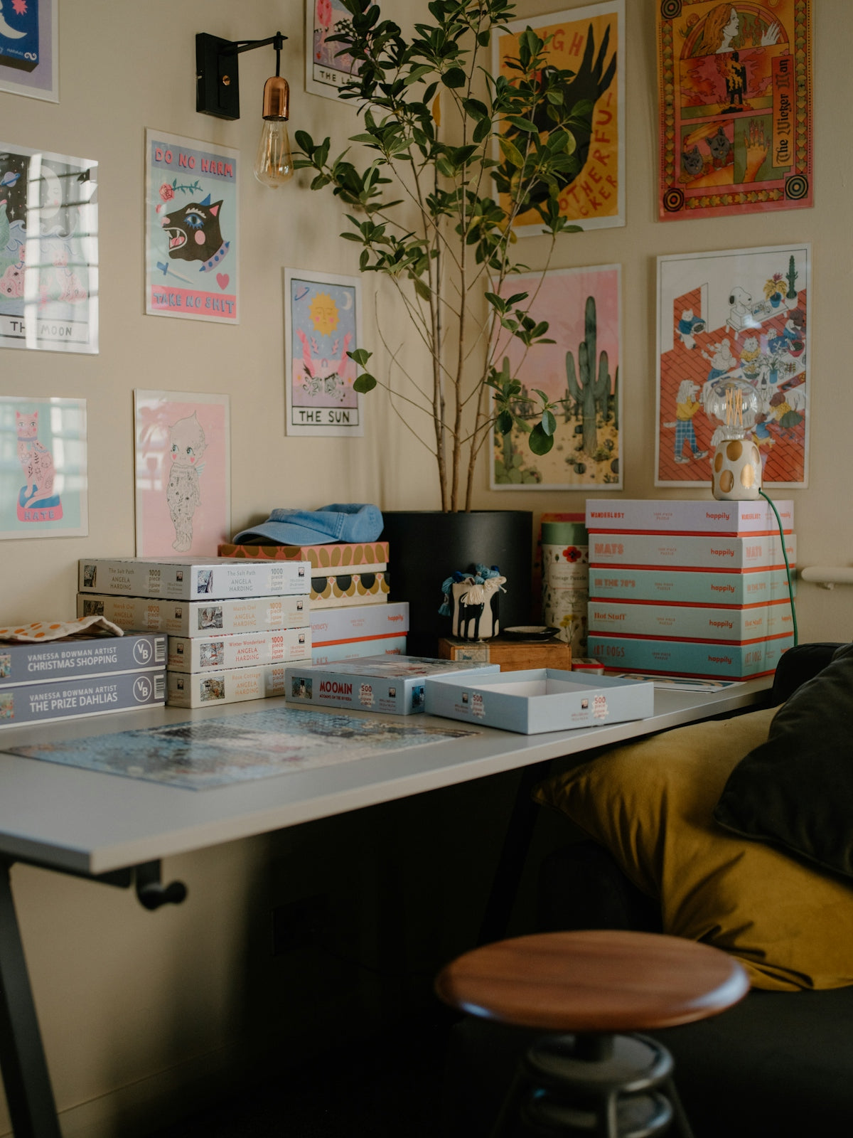 Desk with puzzles and colorful wall art