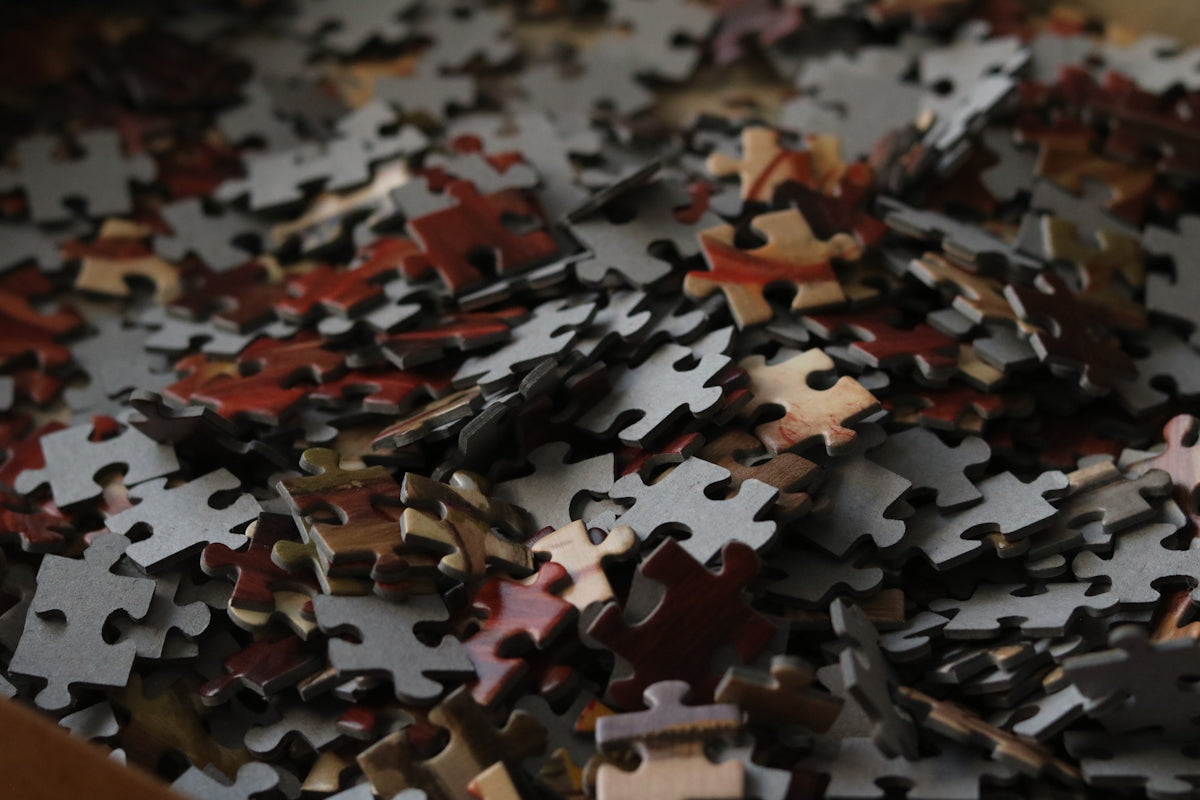 A pile of scattered puzzle pieces